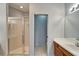 Bathroom with shower, vanity, and separate toilet area at 1950 Sterling Glen Ct, Sun City Center, FL 33573