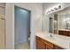 Bathroom with single sink vanity, shower, and toilet at 1950 Sterling Glen Ct, Sun City Center, FL 33573