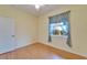 Bedroom with laminate flooring, ceiling fan, and window coverings at 1950 Sterling Glen Ct, Sun City Center, FL 33573