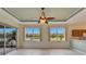 Gathering room with water views and kitchen access at 1950 Sterling Glen Ct, Sun City Center, FL 33573