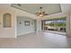 Gathering room with water views and ceiling fan at 1950 Sterling Glen Ct, Sun City Center, FL 33573