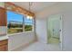 Kitchen nook with laundry access and a view at 1950 Sterling Glen Ct, Sun City Center, FL 33573