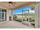 Relaxing screened patio with pond view at 1950 Sterling Glen Ct, Sun City Center, FL 33573