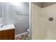 Bathroom with shower, toilet, and sink at 2002 E Ellicott St, Tampa, FL 33610