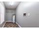 Functional laundry room with water heater and shelving at 2002 E Ellicott St, Tampa, FL 33610