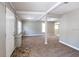 Open living room with gray walls and carpet at 2002 E Ellicott St, Tampa, FL 33610