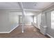 Bright living room with gray walls and carpet at 2002 E Ellicott St, Tampa, FL 33610