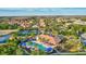 Aerial view of community pool, tennis courts, and homes at 20105 Umbria Hill Dr, Tampa, FL 33647