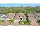 Aerial view of homes with tile roofs and landscaping at 20105 Umbria Hill Dr, Tampa, FL 33647