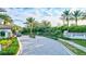 Gated community entrance with landscaping and signage at 20105 Umbria Hill Dr, Tampa, FL 33647