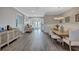 Elegant dining room with wood floors and a large table at 20105 Umbria Hill Dr, Tampa, FL 33647