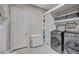 Laundry room with washer, dryer, and extra storage at 20105 Umbria Hill Dr, Tampa, FL 33647