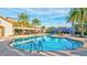 Resort-style pool with lounge chairs and shade structures at 20105 Umbria Hill Dr, Tampa, FL 33647