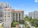 Aerial view of building with pool and waterfront views at 2109 Bayshore Blvd # 602, Tampa, FL 33606