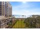 Stunning balcony view overlooking the bay, lush green space, and cityscape at 2109 Bayshore Blvd # 602, Tampa, FL 33606