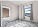 Bright bedroom with water view and marble floors at 2109 Bayshore Blvd # 602, Tampa, FL 33606