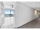 Hallway with view into a room featuring marble floors and bay views at 2109 Bayshore Blvd # 602, Tampa, FL 33606