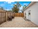 Small backyard with gravel and seating at 2504 W Fletcher Ave, Tampa, FL 33618