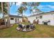 Backyard with firepit and shed at 2504 W Fletcher Ave, Tampa, FL 33618