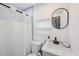 Clean bathroom featuring a shower/tub combo and modern vanity at 2504 W Fletcher Ave, Tampa, FL 33618