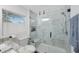 Modern bathroom with marble shower and glass enclosure at 2504 W Fletcher Ave, Tampa, FL 33618