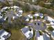 Aerial view of a community with houses and parking at 2650 Barksdale Ct # 0, Clearwater, FL 33761