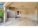 Condo entryway with carport access and neutral color palette at 2650 Barksdale Ct, Clearwater, FL 33761