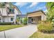 Front view of charming condo with carport and well-manicured landscaping at 2650 Barksdale Ct, Clearwater, FL 33761