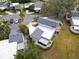 Overhead view of a house with gray roof and a flat roof addition at 2650 Barksdale Ct, Clearwater, FL 33761