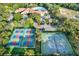 Aerial of community amenities including tennis and pickleball courts at 276 Rochester St, Spring Hill, FL 34609