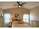 Spacious Primary bedroom with high ceilings, ceiling fan and large windows at 276 Rochester St, Spring Hill, FL 34609