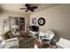 Relaxing sunroom with wicker furniture and TV at 276 Rochester St, Spring Hill, FL 34609