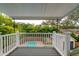 Private balcony overlooking backyard with inground pool at 2812 W Neptune St, Tampa, FL 33629