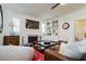 Cozy living room featuring a fireplace and built-in shelving at 2812 W Neptune St, Tampa, FL 33629