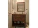 Bathroom with a vanity and a mirror at 3001 58Th S Ave # 203, St Petersburg, FL 33712