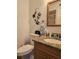 Clean bathroom with granite vanity and decorative accents at 3001 58Th S Ave # 203, St Petersburg, FL 33712