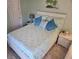 Bedroom with a white queen bed and light blue bedding at 3001 58Th S Ave # 203, St Petersburg, FL 33712