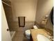 Bathroom with shower, toilet, and granite vanity at 3001 58Th S Ave # 701, St Petersburg, FL 33712