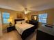 Bright bedroom with a queen-size bed, and ensuite bathroom at 3001 58Th S Ave # 701, St Petersburg, FL 33712