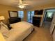 Bedroom with a queen bed, and access to a full bathroom at 3001 58Th S Ave # 701, St Petersburg, FL 33712