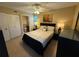 Bedroom with a queen-size bed and access to a full bathroom at 3001 58Th S Ave # 701, St Petersburg, FL 33712