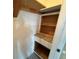 Built-in shelving and drawers in this spacious closet at 3001 58Th S Ave # 701, St Petersburg, FL 33712