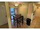 Small dining area with table and chairs near sliding door at 3001 58Th S Ave # 701, St Petersburg, FL 33712