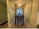 Dining area with table and chairs, sliding door to patio at 3001 58Th S Ave # 701, St Petersburg, FL 33712