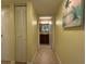 Bright hallway with tile flooring and access to bathroom at 3001 58Th S Ave # 701, St Petersburg, FL 33712