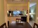 Kitchen features ample cabinetry, dual sinks, and views to the living area at 3001 58Th S Ave # 701, St Petersburg, FL 33712