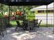 Patio table and chairs under a gazebo at 3001 58Th S Ave # 701, St Petersburg, FL 33712