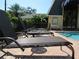 Relaxing poolside loungers for residents' enjoyment at 3001 58Th S Ave # 701, St Petersburg, FL 33712