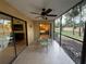 Private screened patio with outdoor seating and access to living room at 3001 58Th S Ave # 701, St Petersburg, FL 33712