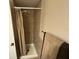 Shower stall with tiled walls and a shower curtain at 3001 58Th S Ave # 701, St Petersburg, FL 33712